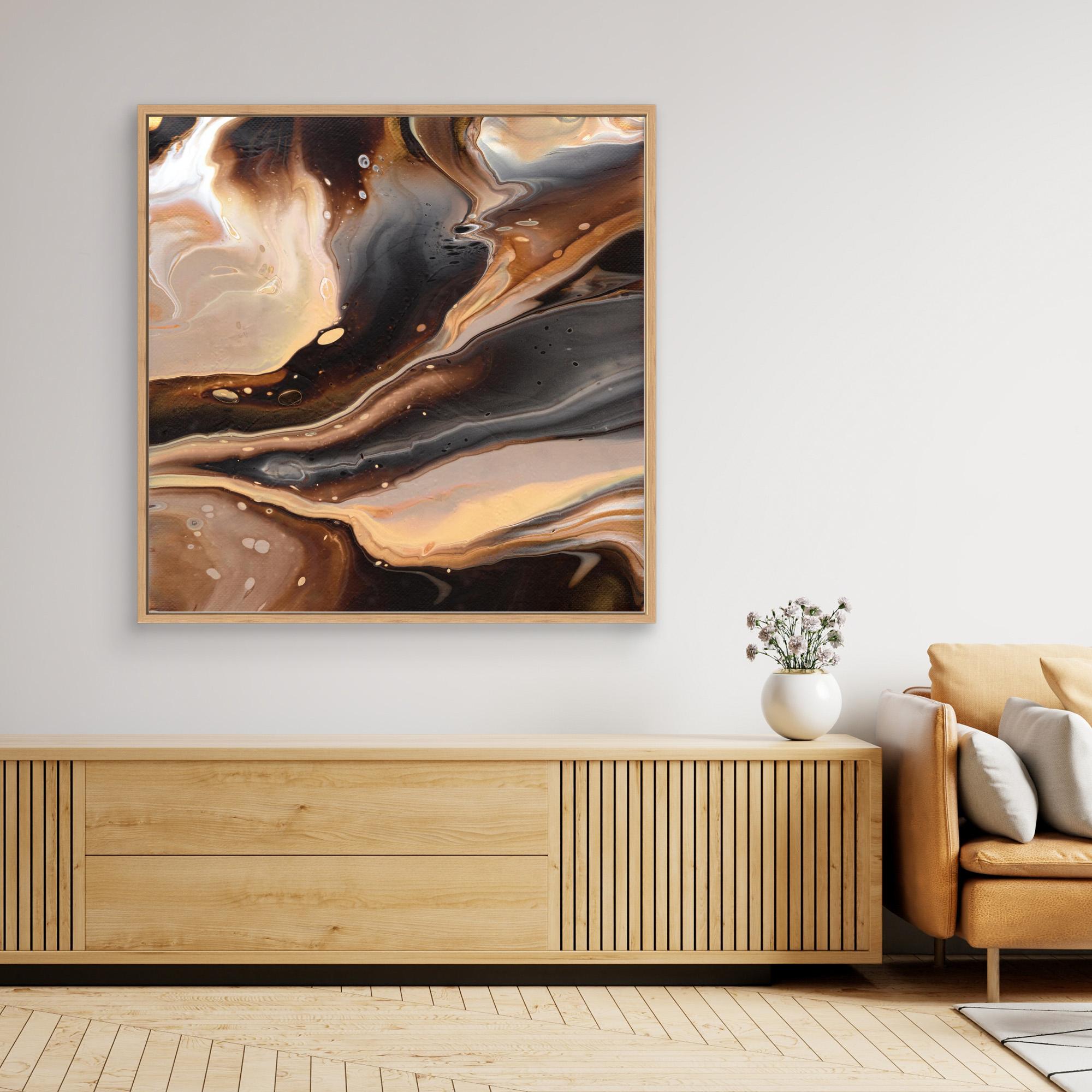 NL Modern Art Canvas Print Comforting Chocolate Caramel 2 in oak frame on wall over wooden cabinet and white vase with flowers