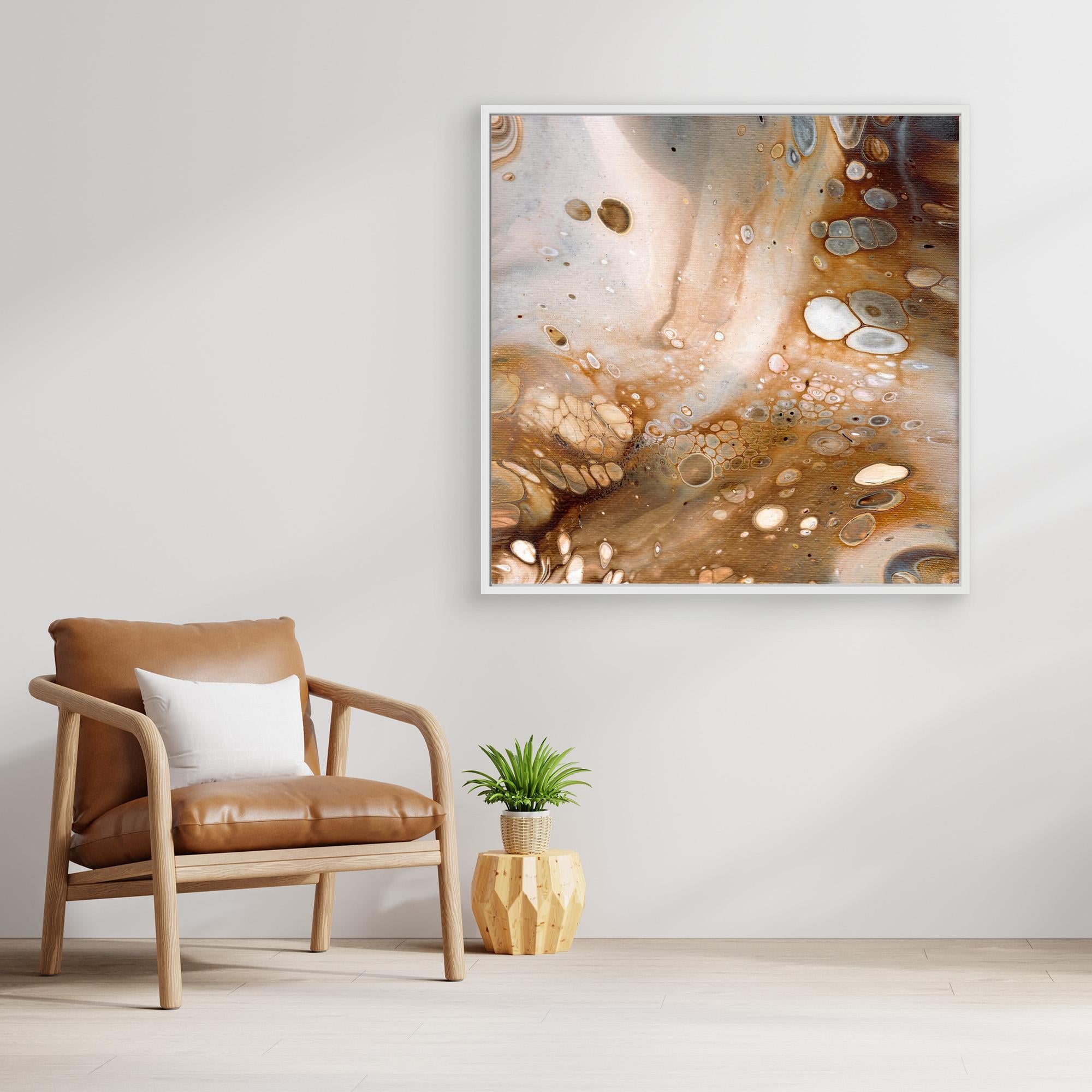 NL Modern Art Art Prints Soothing Neutrals 5 in white frame on wall next to comfy chair and small plant