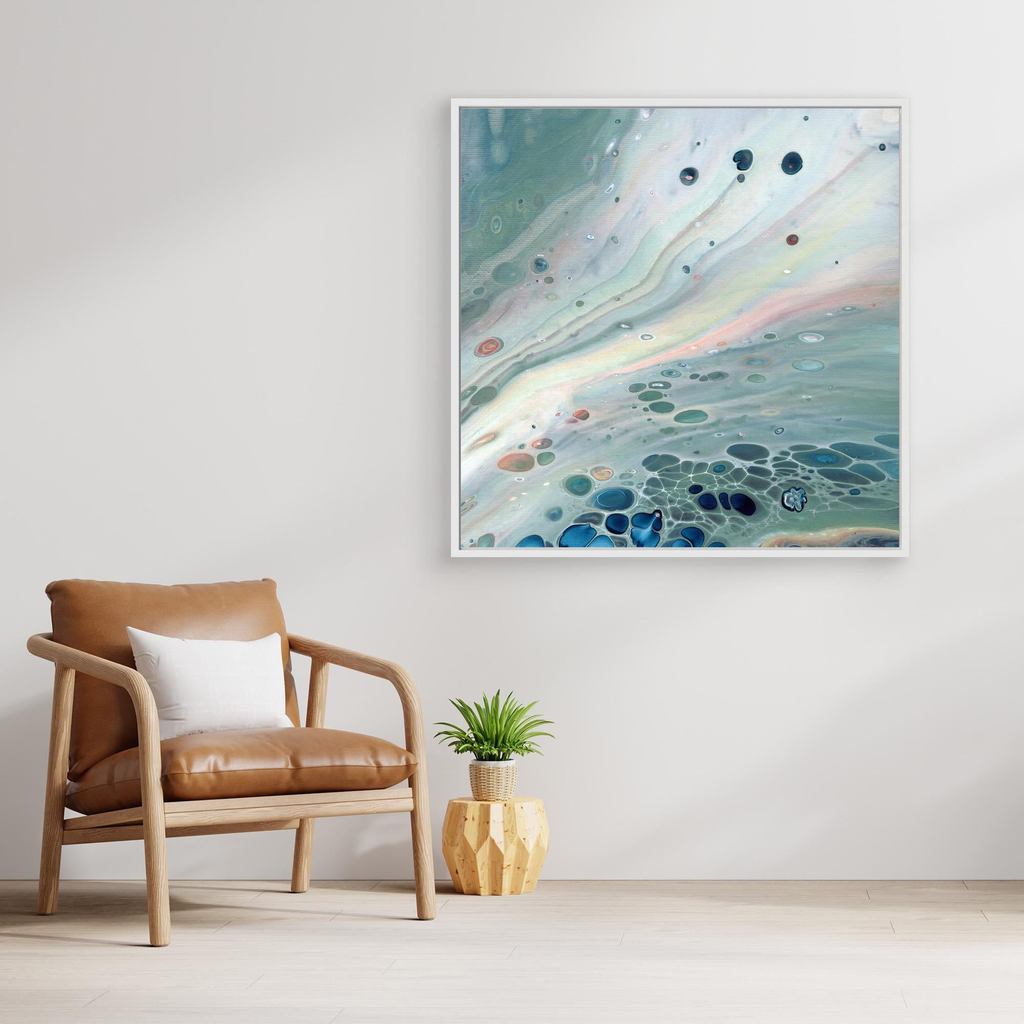 NL Modern Art Wall Art Canvas Print Gentle Pastel 4 in white frame next to comfy chair and little plant