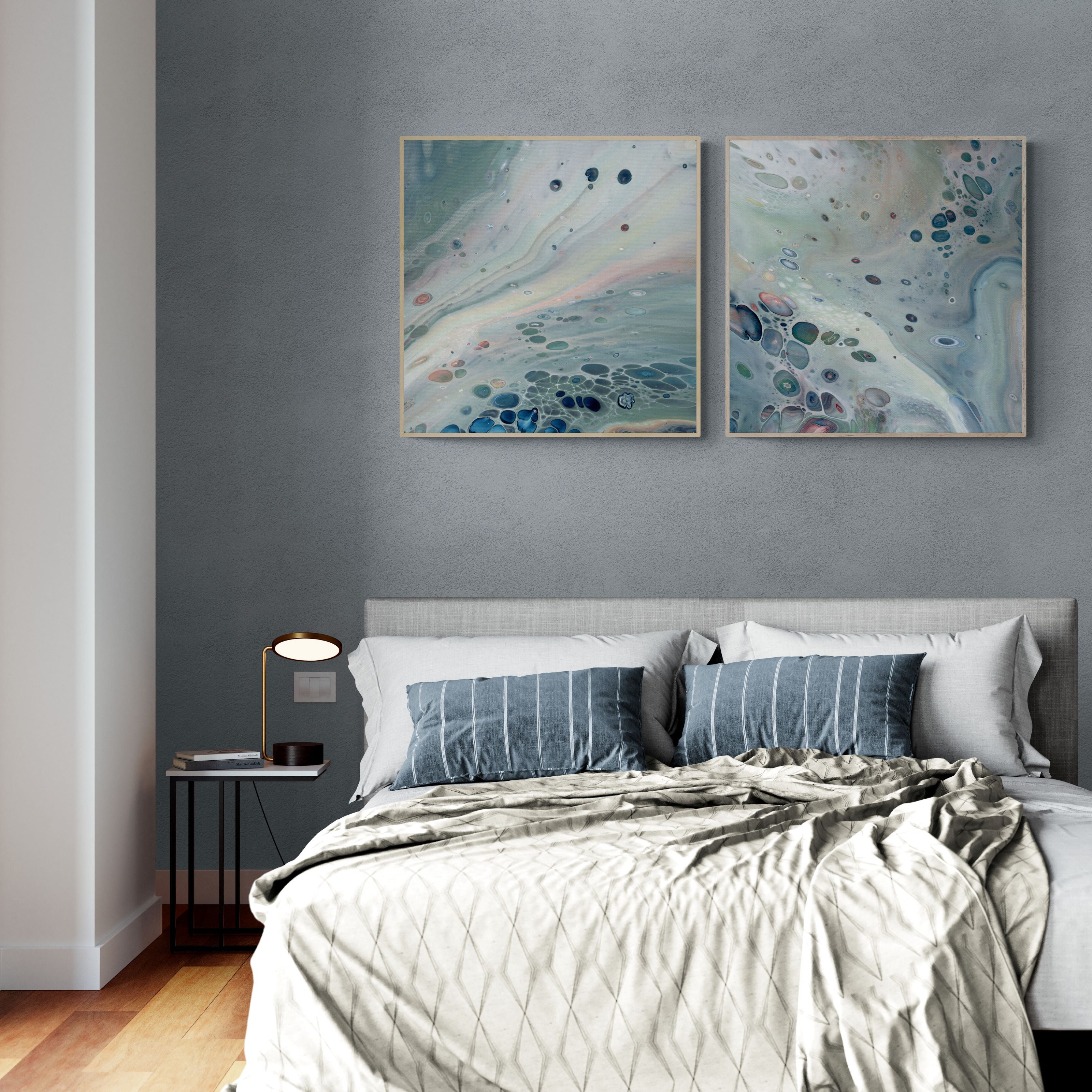 Canvas prints-gentle-pastel-diptych-in-oak frame in modern-bedroom-with-side-table