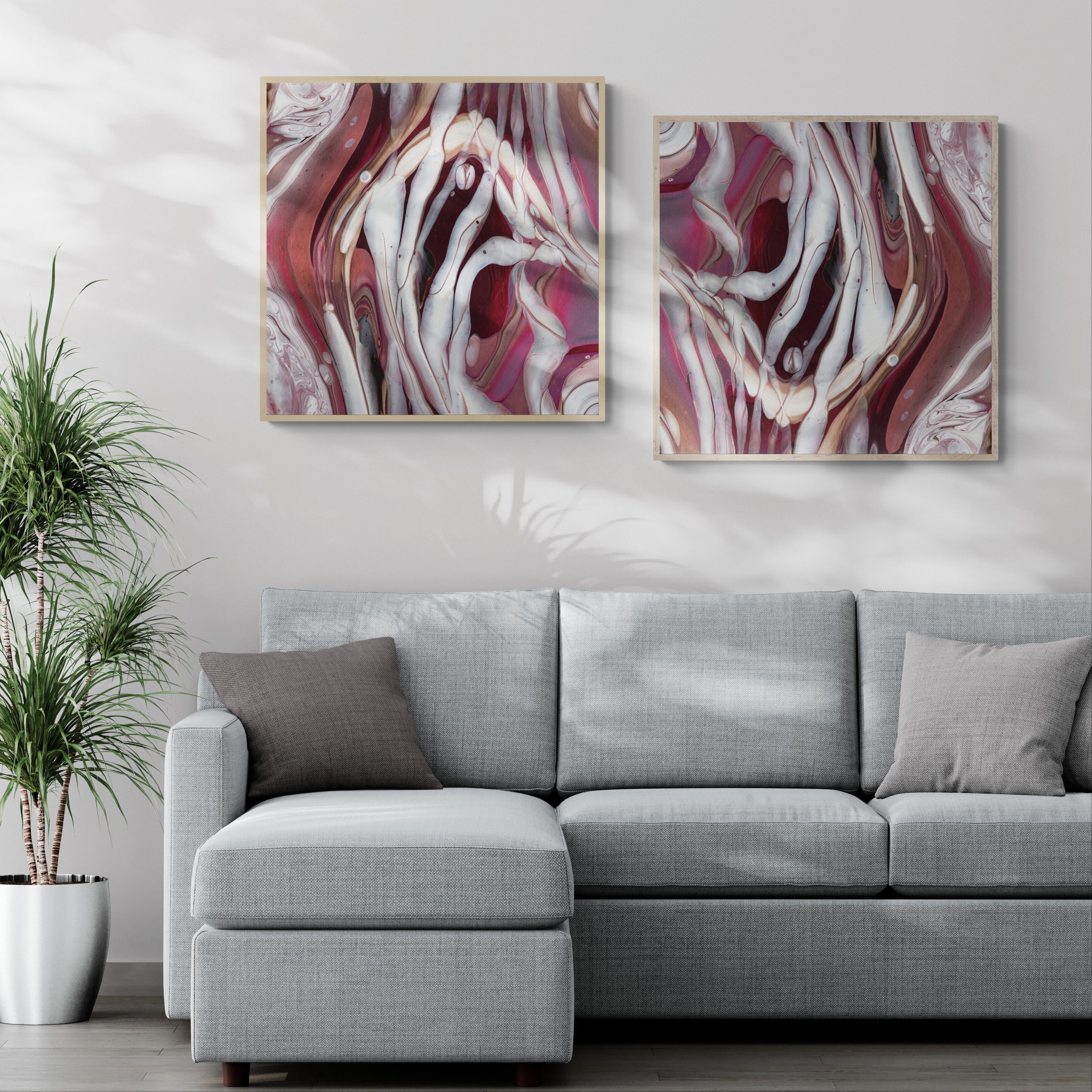 NL modern art-canvas-print-ardent-love-8-and-9-diptych in oak frame on wall-in-living-room-with-sofa-and-tropical-plant