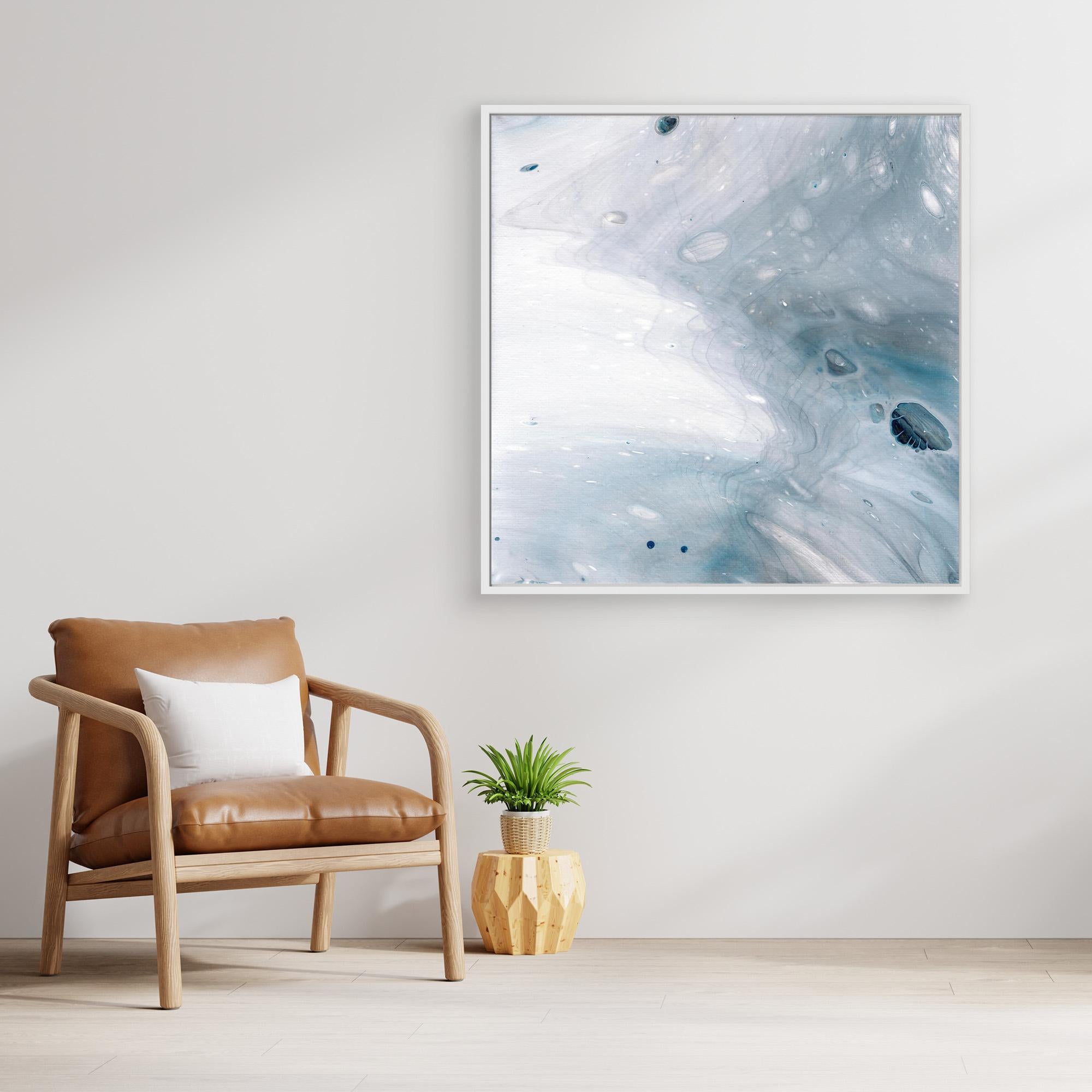 NL Modern Art Wall Art Canvas Print Gentle Pastel 5 in white frame next to comfy chair and little plant