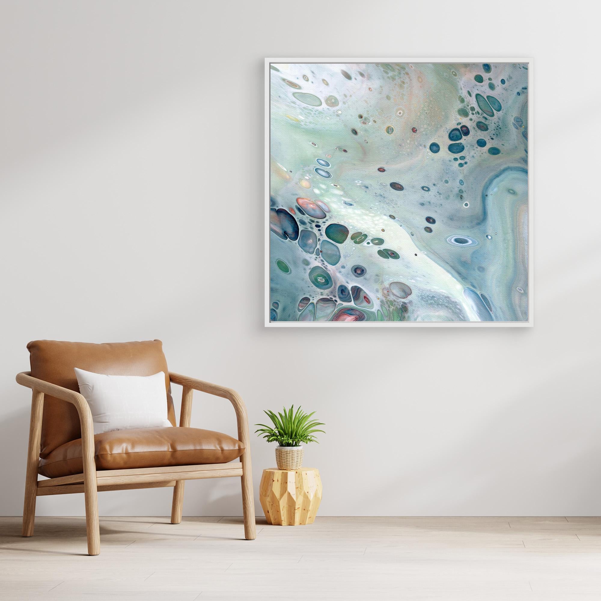NL modern art Wall Art Canvas Print Gentle Pastel 3 in white frame next to comfy chair and small plant