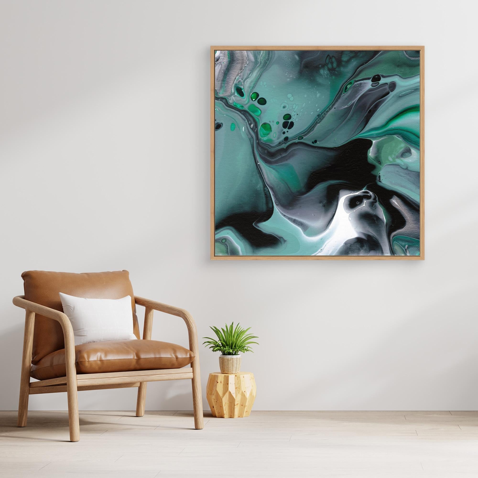 NL modern art Art Print Manchester Uplifting Malachite 1 in oak frame on wall next to comfy chair and small plant