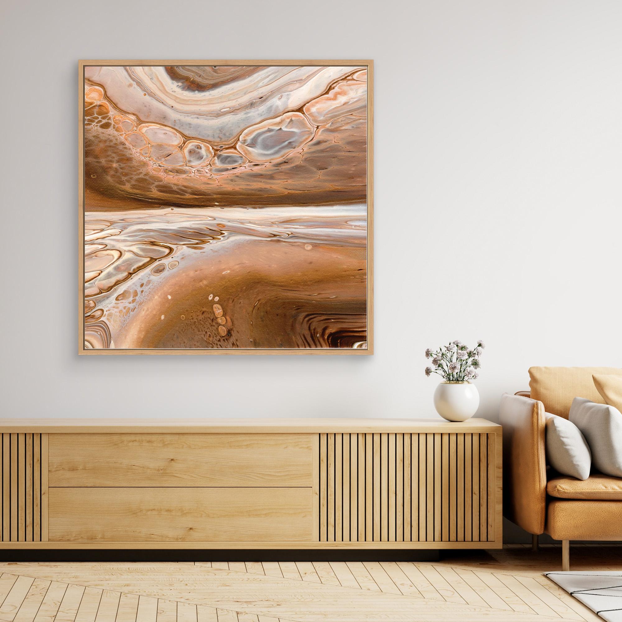 NL modern art Art Prints Soothing Neutrals 6 in oak frame on wall over wooden cabinet and white vase with flowers