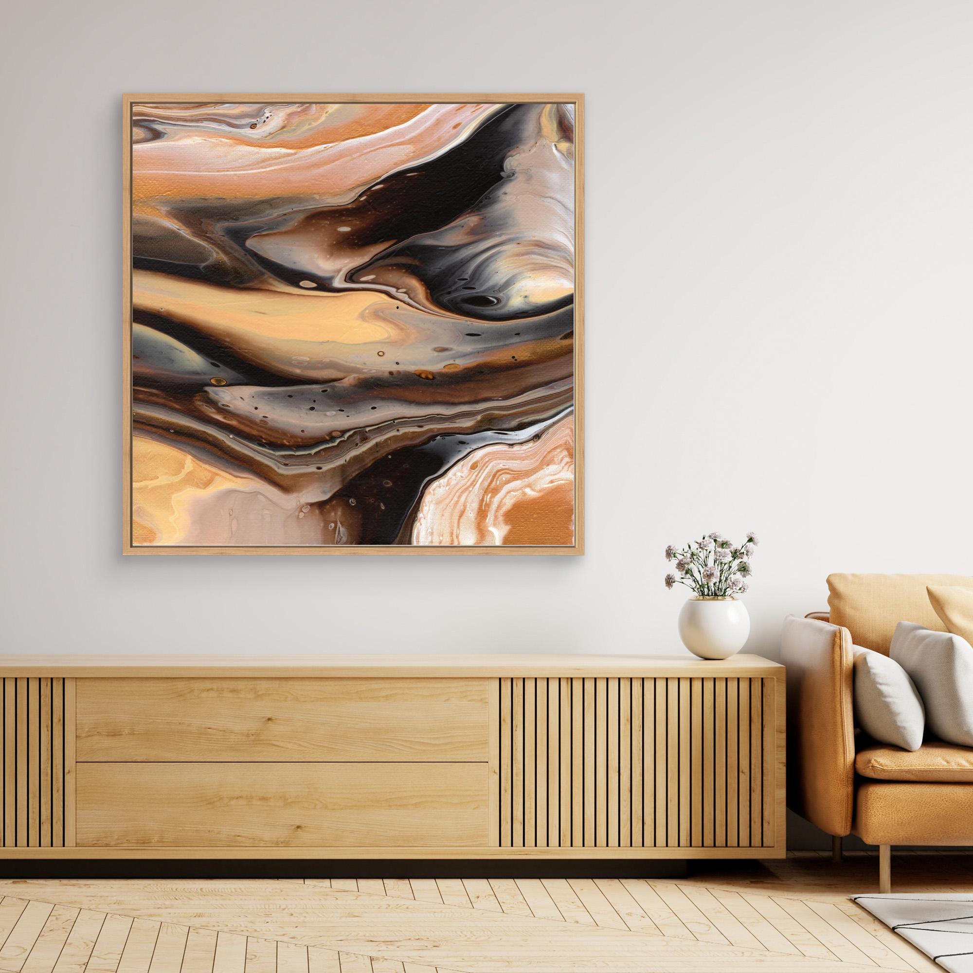 NL Modern Art Canvas Print Comforting Chocolate Caramel 1 in oak frame on wall over wooden cabinet and white vase with flowers
