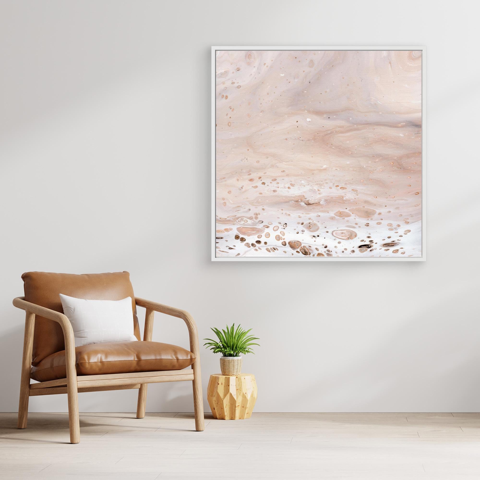 NL modern art Art Prints Soothing Neutrals 2 in white frame on wall next to comfy chair and small plant