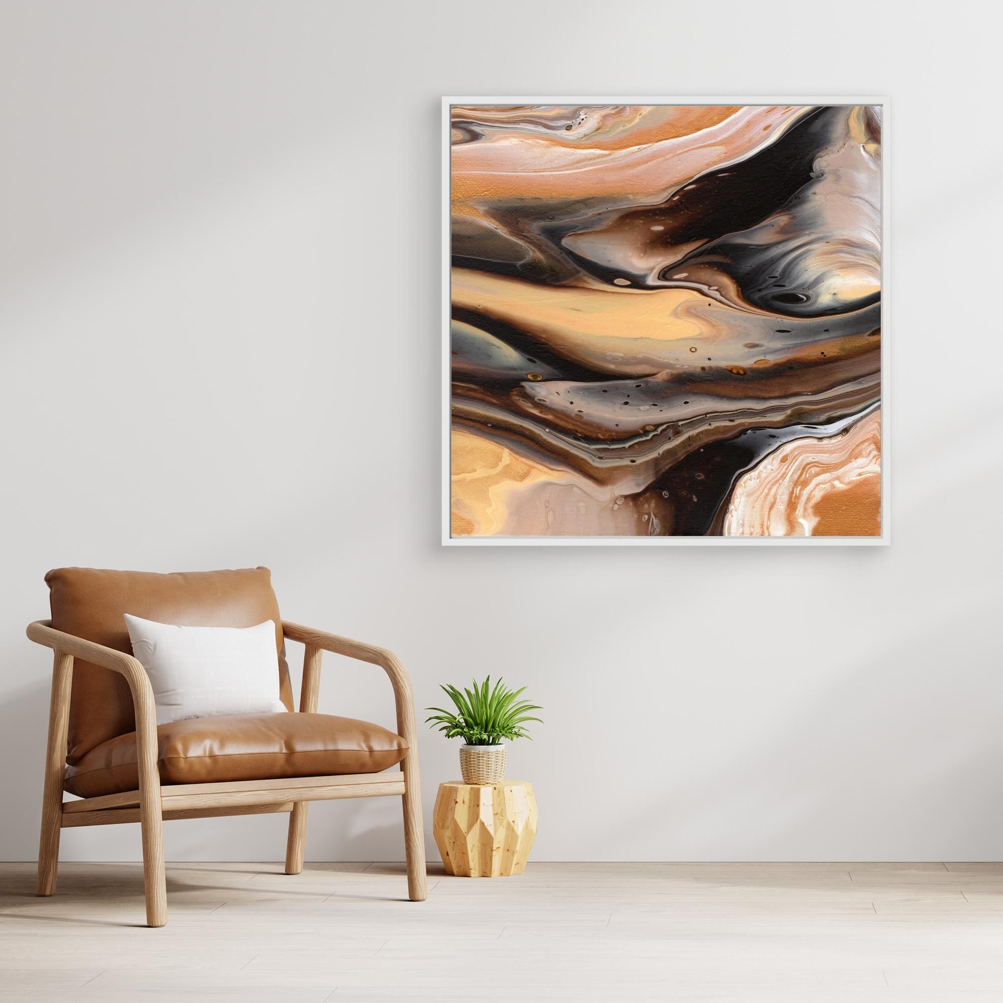 NL Modern Art Canvas Print Comforting Chocolate Caramel 1 in white frame on wall next to comfy chair and small plant