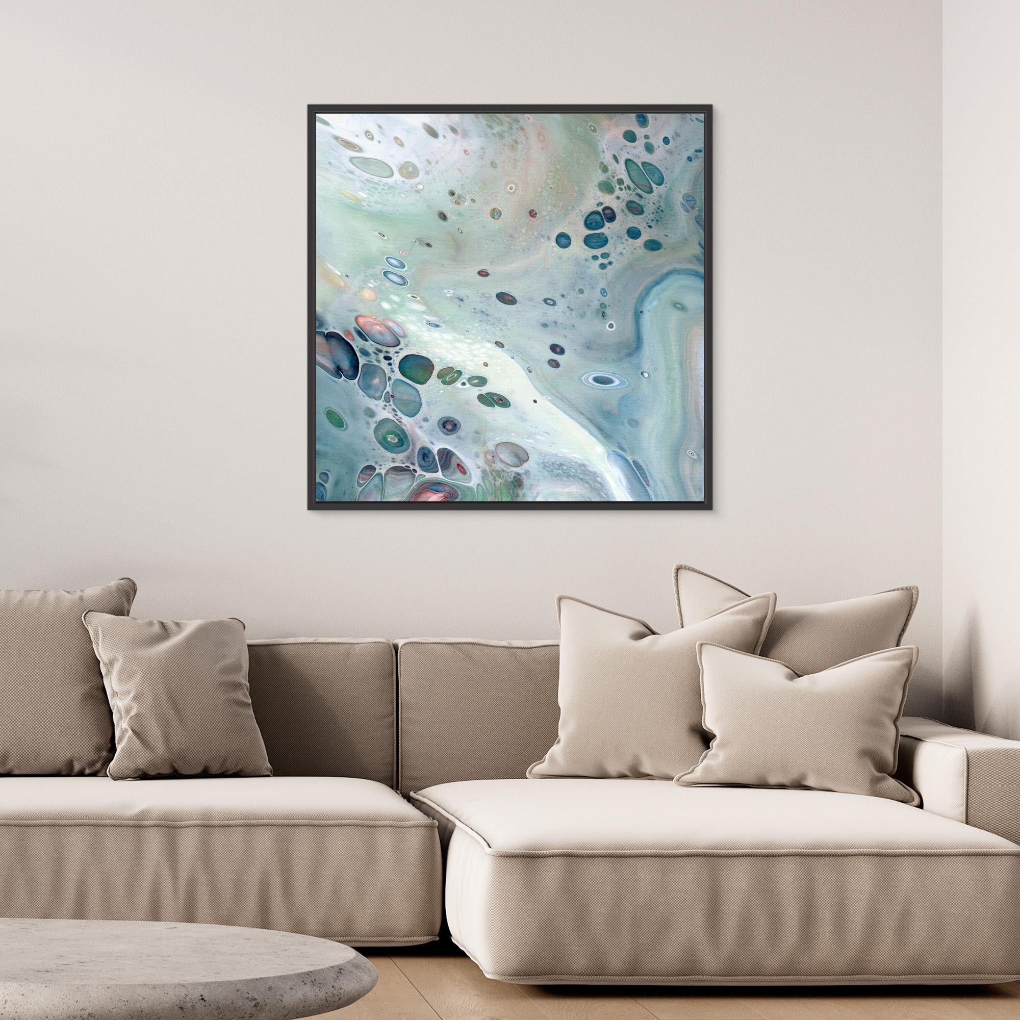 NL modern art Wall Art Canvas Print Gentle Pastel 3 in black frame over comfy sofa