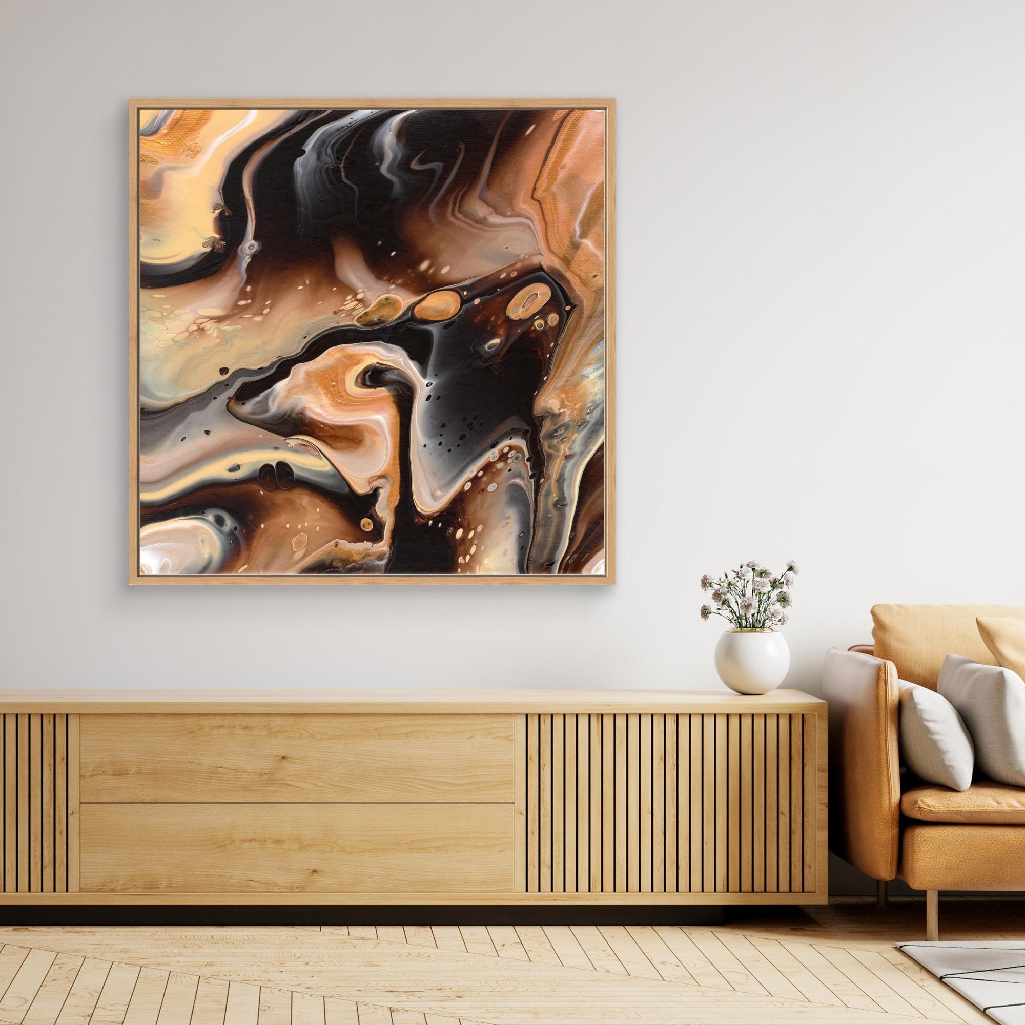 NL modern art Canvas Print Comforting Chocolate Caramel 4 in oak frame on wall over wooden cabinet and white vase with flowers