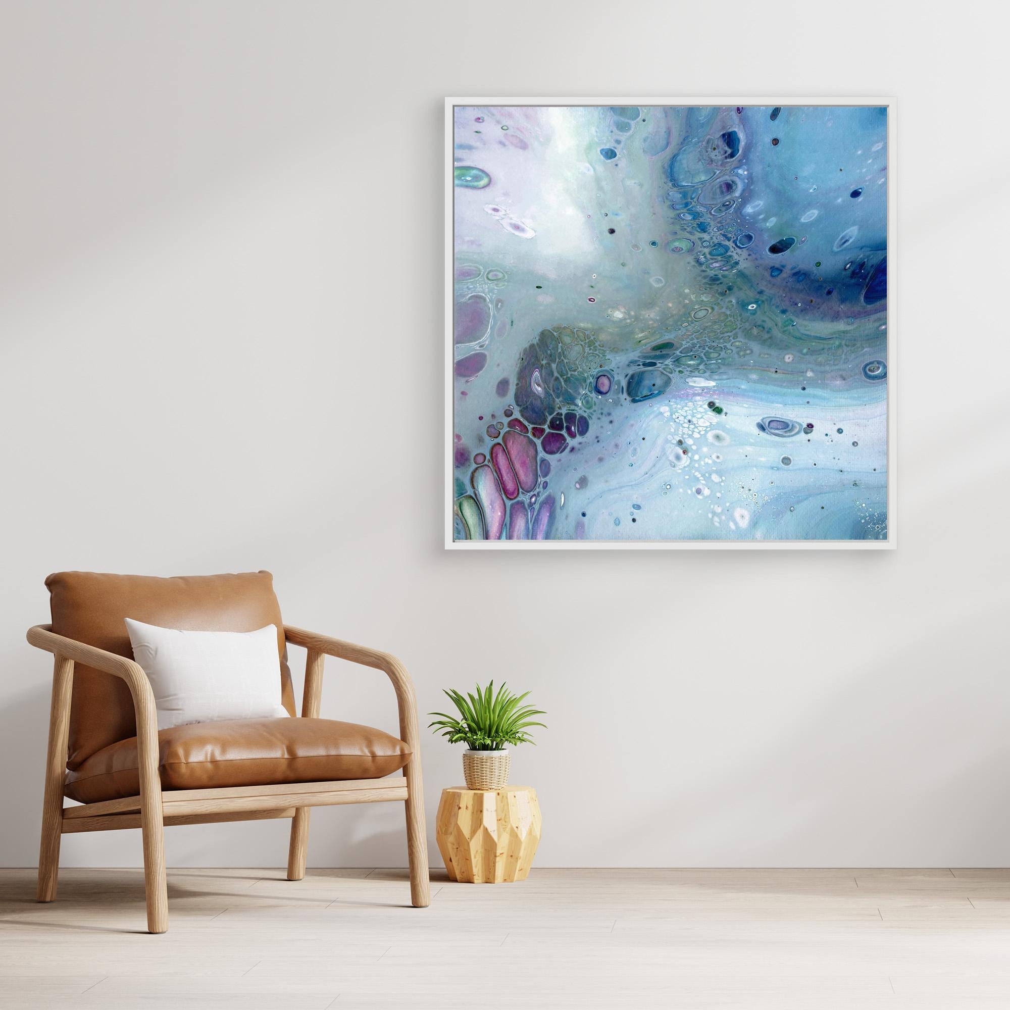 NL modern art Wall Art Canvas Print Gentle Pastel 1 in white frame next to comfy chair and small plant