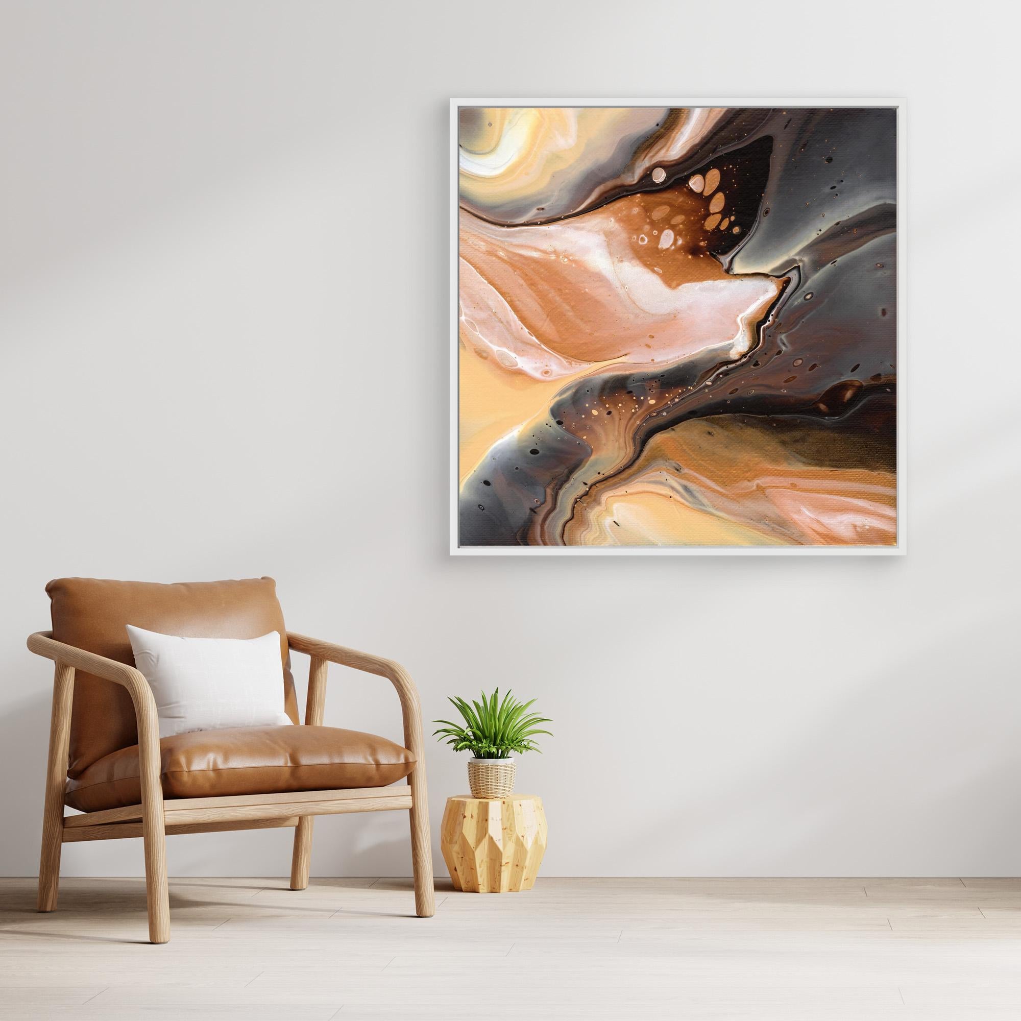 NL Modern Art Canvas Print Comforting Chocolate Caramel 3 in white frame on wall next to comfy chair and small plant
