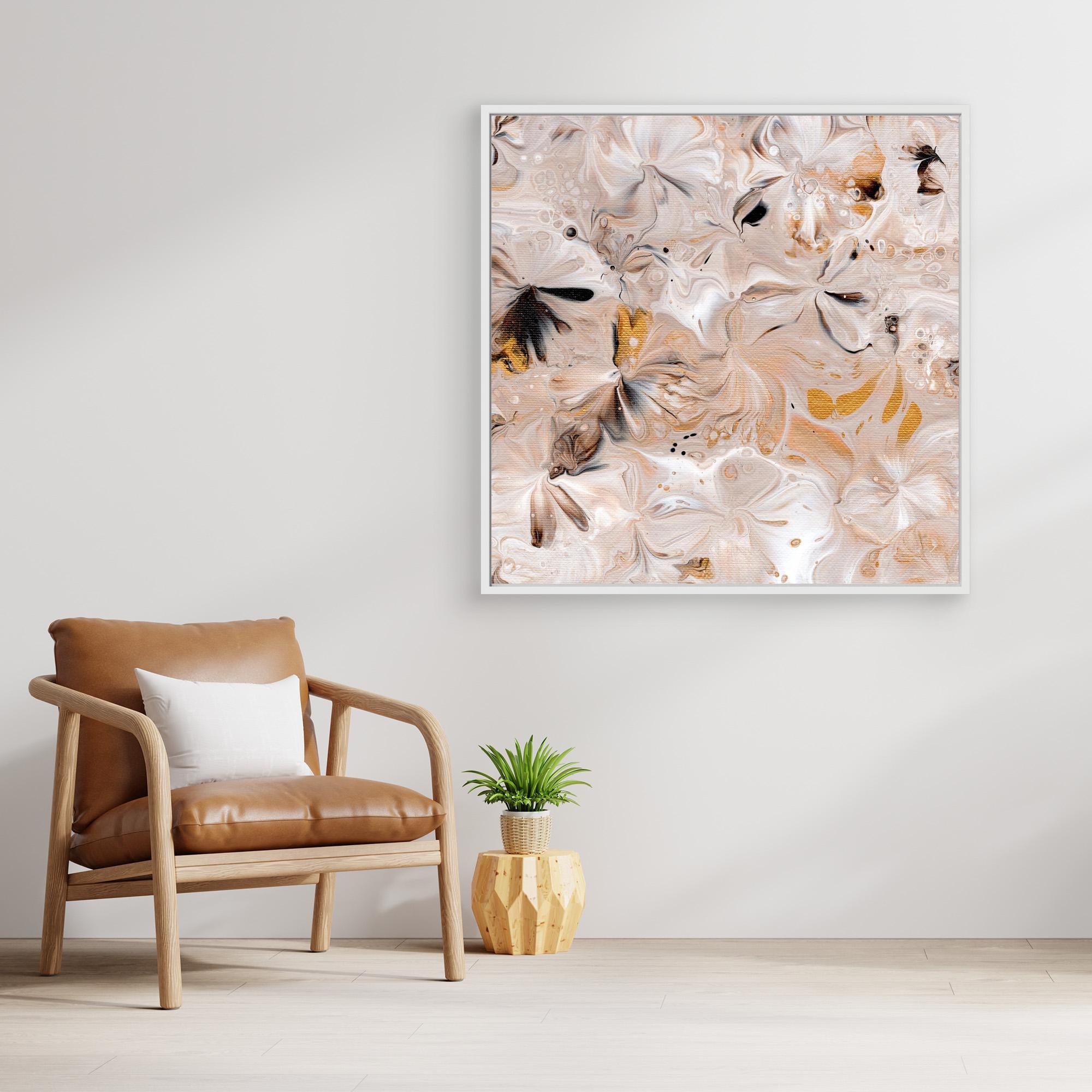 NL modern art Art Prints Soothing Neutrals 3 in white frame on wall next to comfy chair and small plant