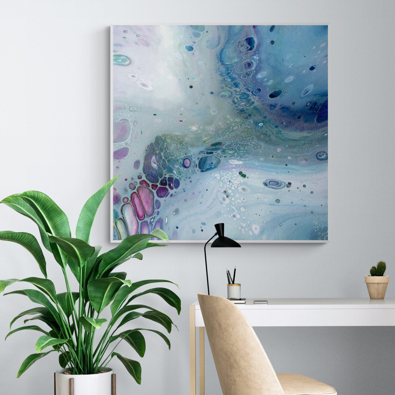 NL modern art-wall-art- canvas print gentle-pastel-1 in white frame in-home-office-with-large-tropical-plant