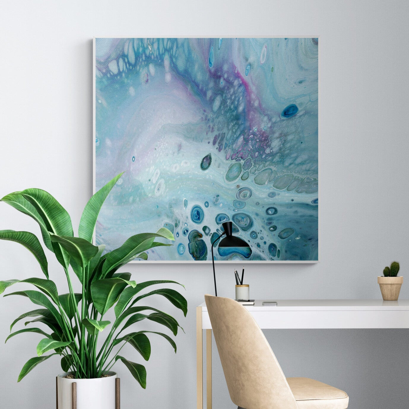 NL modern art-wall-art- canvas print gentle-pastel-2-in white frame in-home-office-with-large-tropical-plant