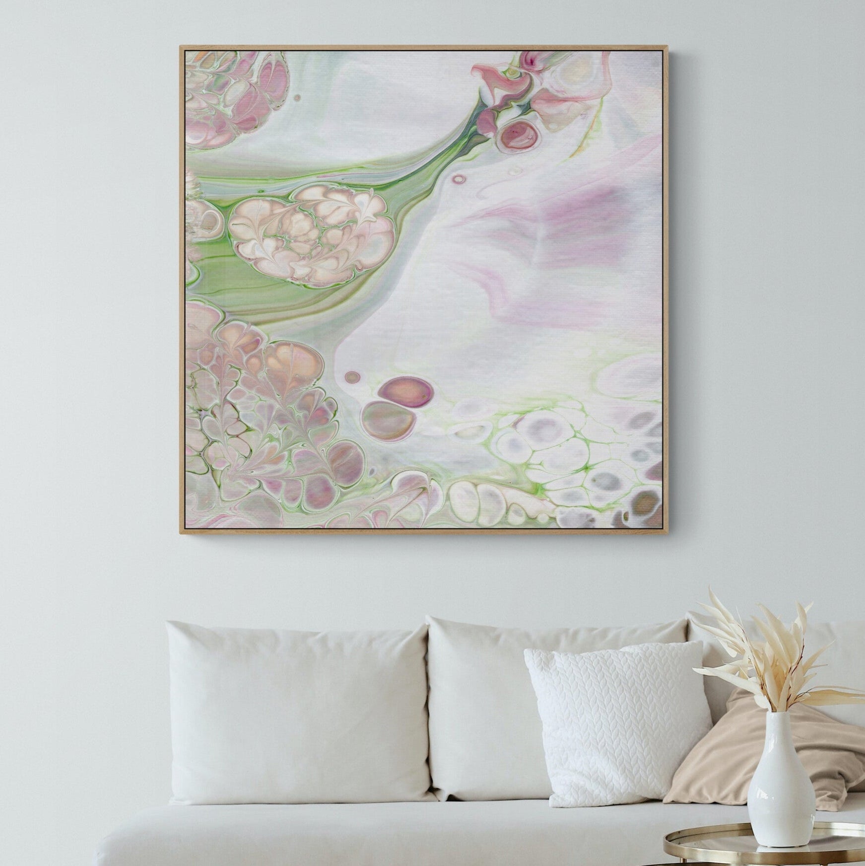 NL Modern Art Canvas Print gentle-tenderness-4-in oak frame on wall in-small-living-room-space-with-natural-tones