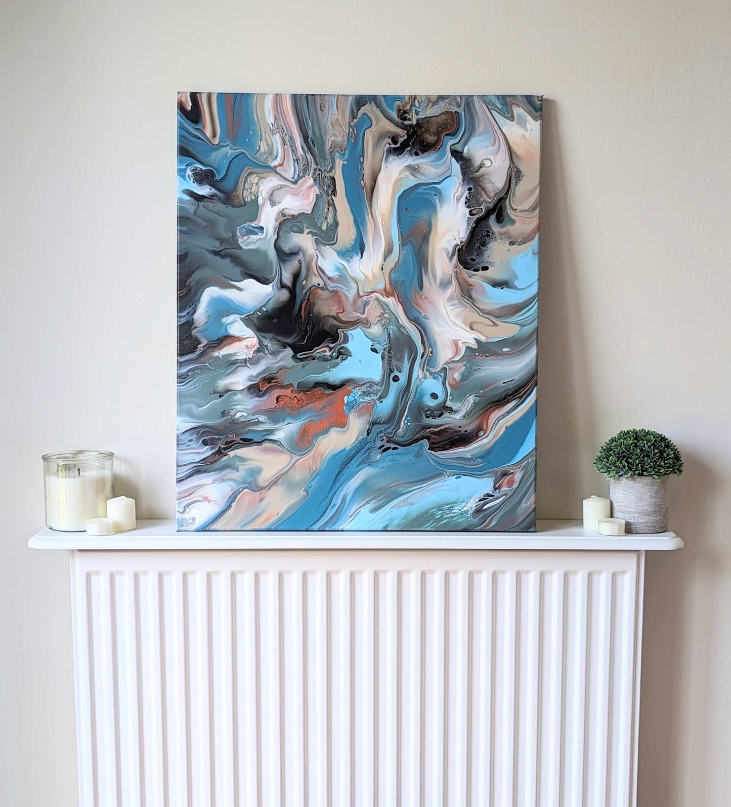 Canvas on shelf – frontal view of original abstract painting in muted hues made with professional grade acrylic paint.