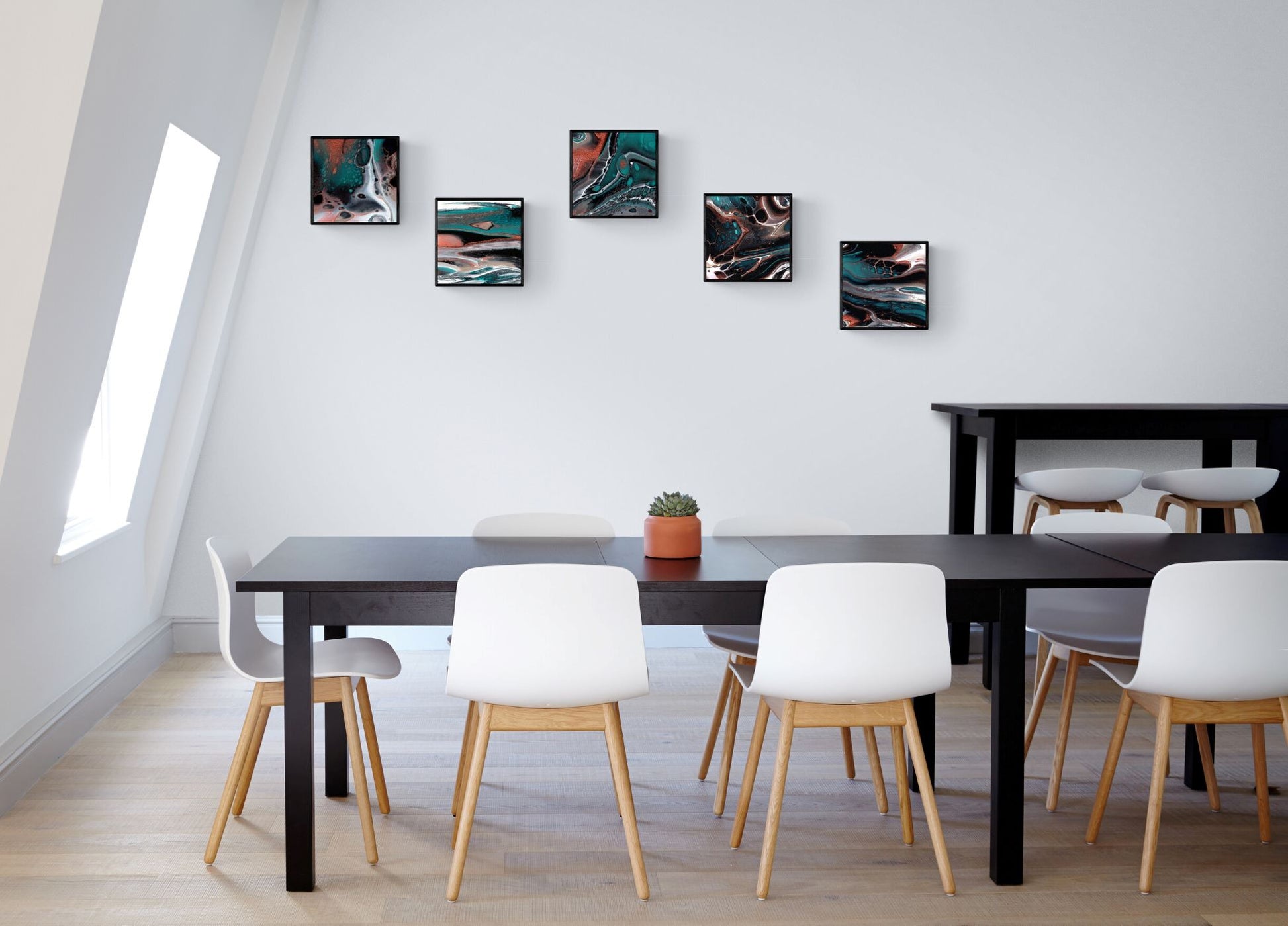 5 framed prints 30x30 cm in a business lunch room