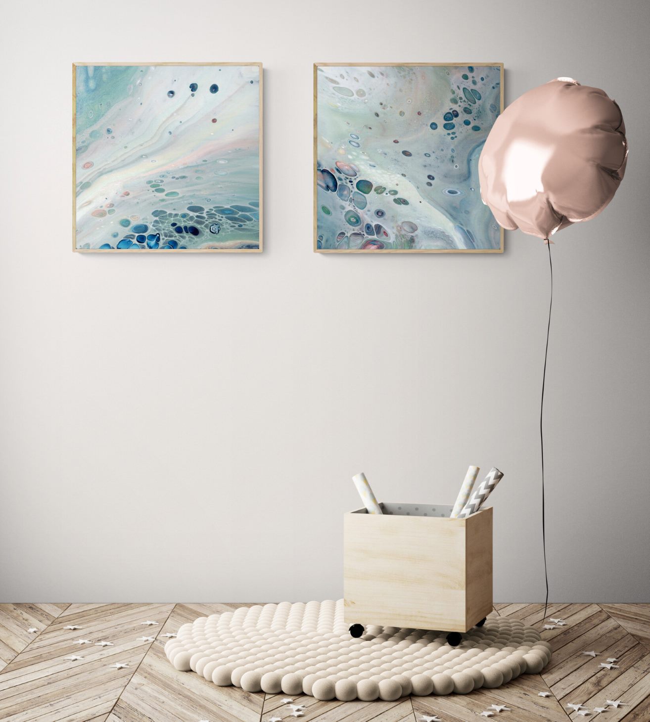 2 50x50 cm framed prints in pastel tones in a children's playroom with balloon and decorations