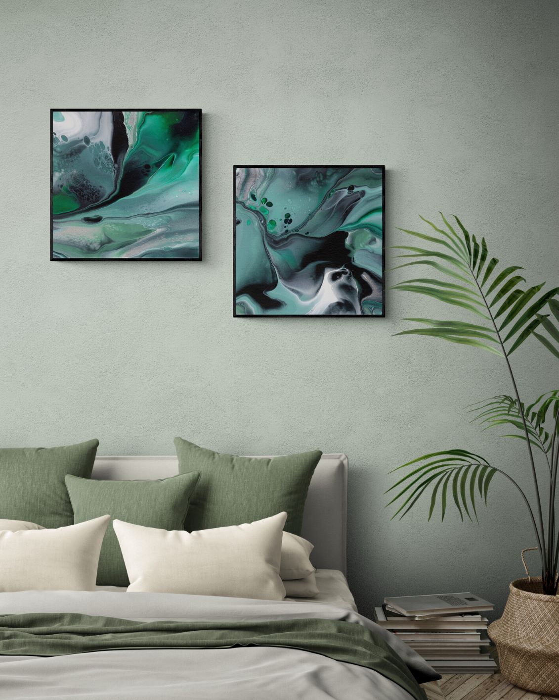 2 framed prints 50x50 cm in a bedroom with a large tropical plant