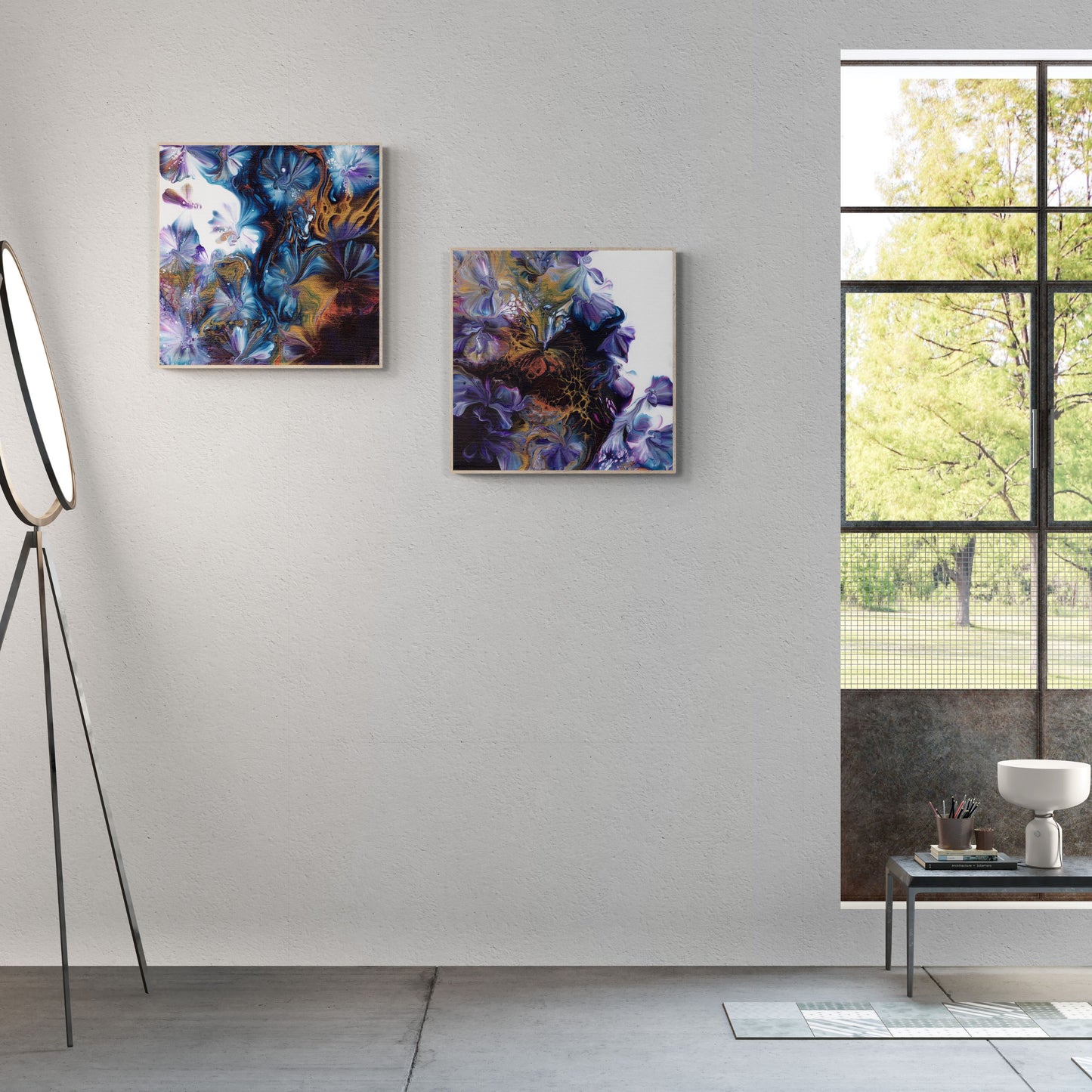 2 abstract floral framed prints 70x70 cm on a wall with led floor lamp next to the wall