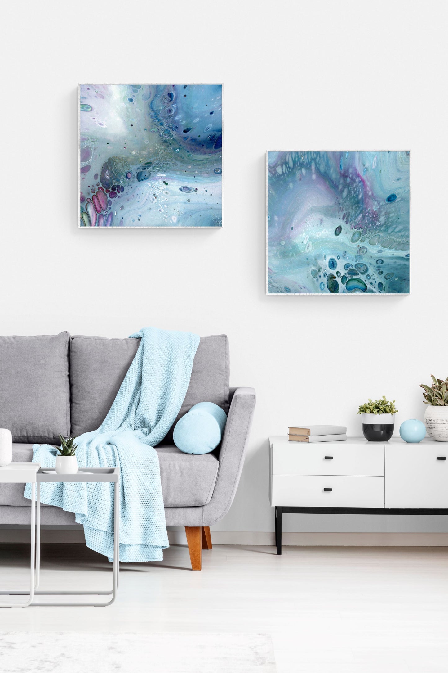 2 framed prints 70x70 cm in pastel tones in a stylish living room